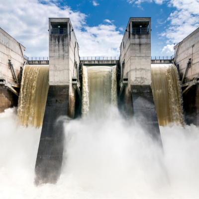 Powerful falls in a concrete hydroelectric dam.