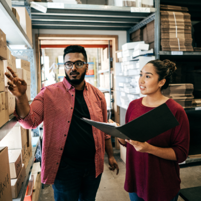 A small business owner talking to a loan officer