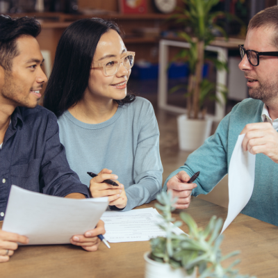A couple discusses a home equity loan with loan officer