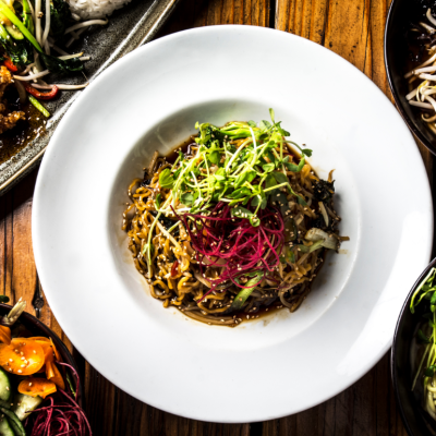 A selection of five vegan dishes on a table.