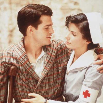 Actors Chris O'Donnell and Sandra Bullock in the movie 'In Love and War.'
