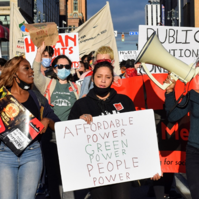 Metro Justice members, a grassroots organization advocating for public power in Rochester, New York