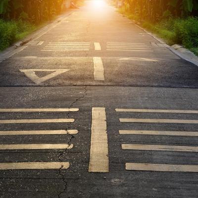 low angle view of road with speed hump and lines painted