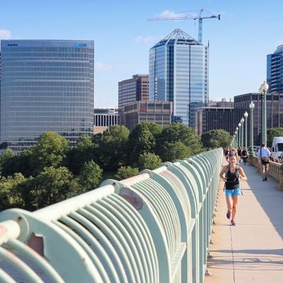 People crossing the Key bridge between Arlington, VA and Washington D.C. 