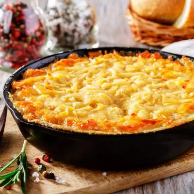Potato side dish in a skillet.