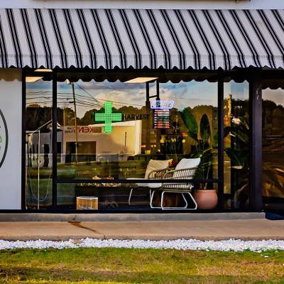 A store called Healthy Harvest CBD is pictured with signage at the front.