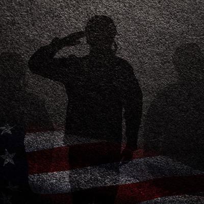 Concept of military sexual assault illustrated by three silhouettes against a dark wall, faint overlay of American flag beneath.