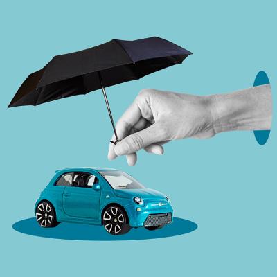 Car safety and insurance concept where an umbrella covers a car figure.