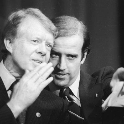 Then-Senator Joe Biden points at the crowd to President Jimmy Carter during a fundraiser in 1978.