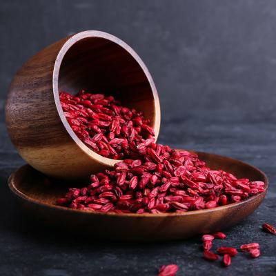 A bowl and plate with dried barberries.