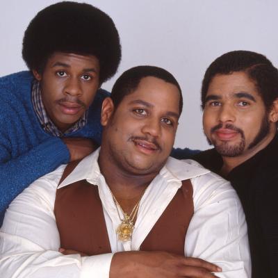 Portrait of pioneering hip-hop group The Sugar Hill Gang—Guy 'Master Gee' O'Brian, Henry 'Big Bank' Jackson, and Michael 'Wonder Mike' Wright—in 1980.
