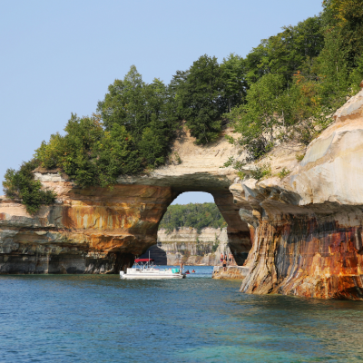 Tourists at Lovers Leap Arch, Pictured Rocks National Lakeshore of Lake Superior near Grand Marais, Michigan