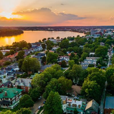 A view of downtown Evansville during sunset on the Ohio River.