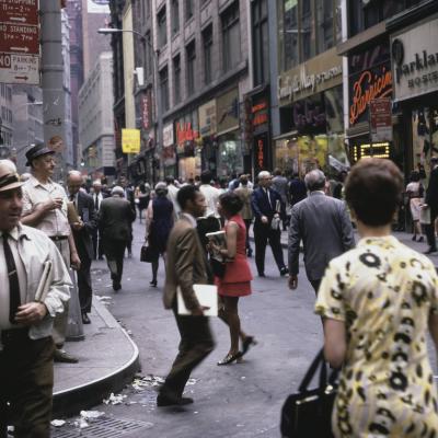 Pedestrians in Downtown Manhattan in New York City, New York, circa 1975.