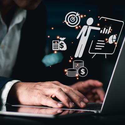 Businessperson using a laptop and finance and treasure holographic icons are illustrated as a concept of a management system software.