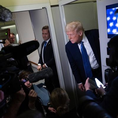 US President Donald Trump speaks to reporters aboard Air Force One while flying to Washington, D.C., from Florida, on March 16, 2025, above Virginia.