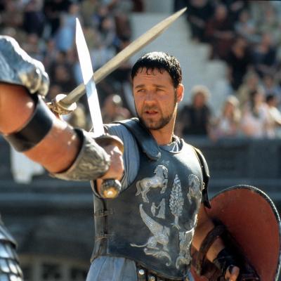 Russell Crowe faces off against another man in a scene from the film “Gladiator."