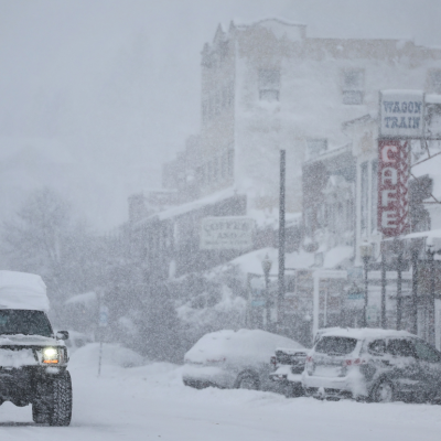  Snow falls downtown, north of Lake Tahoe, during a powerful multiple day winter storm in the Sierra Nevada mountains on March 02, 2024 in Truckee, California.