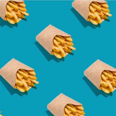 Print of boxes of french fries on a blue background.