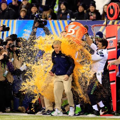 The Seattle Seahawks players dump Gatorade on head coach Pete Carroll.