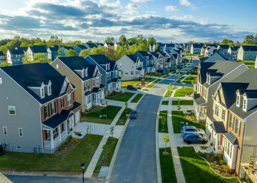 An aerial view of a neighborhood of nice two-story homes.