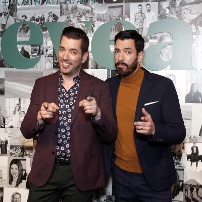 Jonathan Scott and Drew Scott pose during a premier reveal.