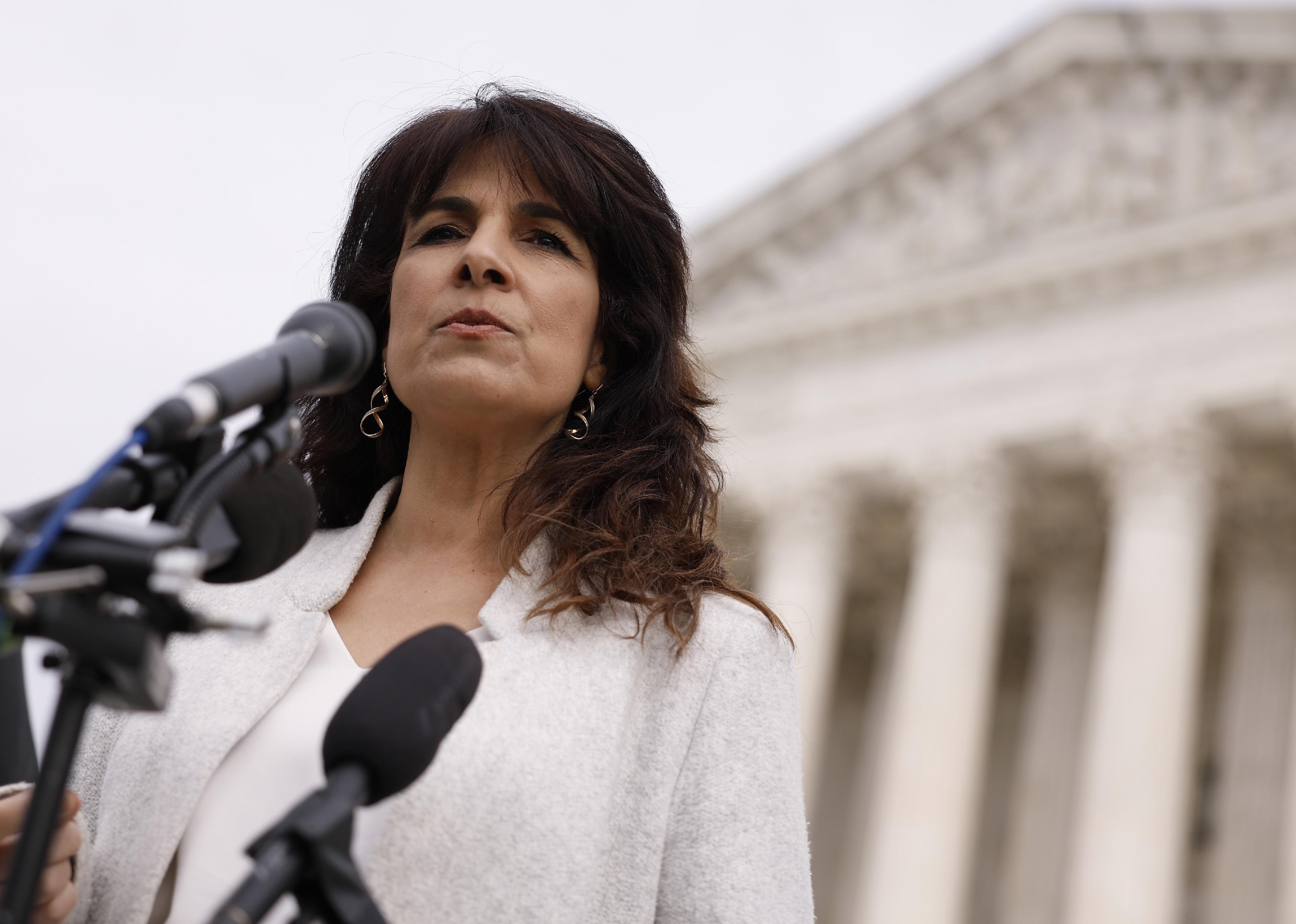 An attorney speaking outside the US Supreme Court building.