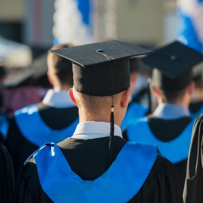 Crowd of graduate students from behind.
