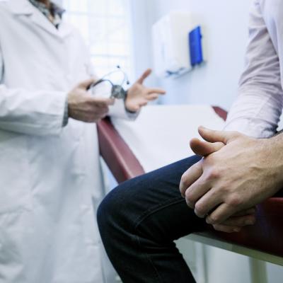 Man in consultation with a doctor.