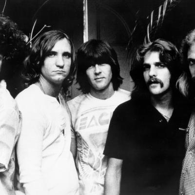 Don Henley, Joe Walsh, Randy Meisner, Glenn Frey, and Don Felder of the rock band  the Eagles pose for a portrait in 1977. 