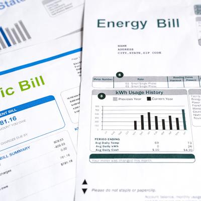 Closeup of monthly energy bills.