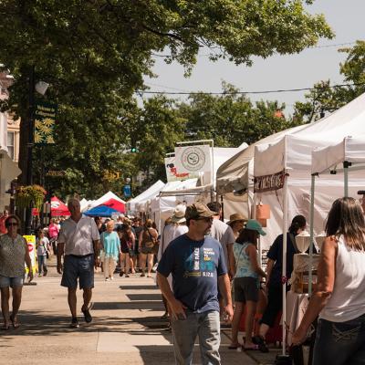 Customers and vendors at The Collingswood Craft and Fine Art Festival in New Jersey.