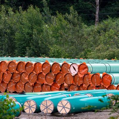 Pieces of the Trans Mountain Pipeline project sit in a storage lot outside of Hope, British Columbia, Canada.