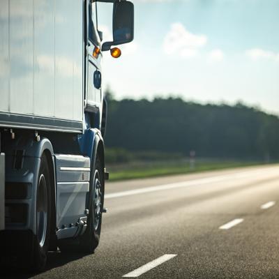 Long moving truck on a highway.