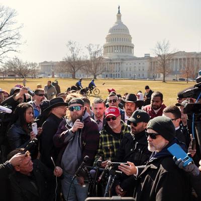 Members of the far-right group the Proud Boys, including their former leader Enrique Tarrio, Stewart Rhodes, Joe Biggs, Ethan Nordean and Zach Rehl speak to journalists on the east side of the U.S. Capitol, Feb. 2025.