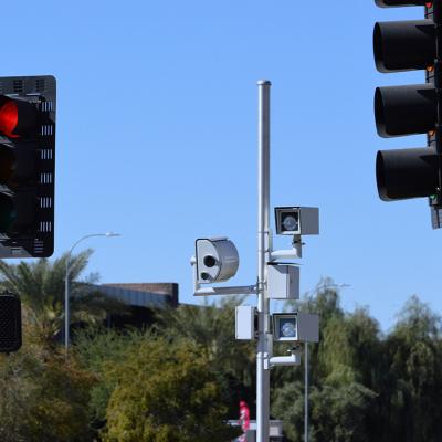 Enforcement cameras along traffic lights.