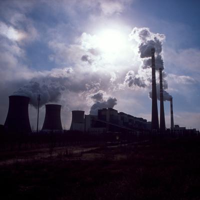 Silhouette of a coal-fired power plant spewing smoke into the air in Daqi, Inner Mongolia Autonomous Region, China.