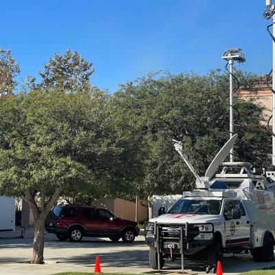 A T-Mobile SatCOLT or Satellite Cells on Light Truck parked on an American Red Cross lot.