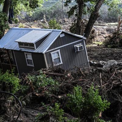 A damaged house is seen near the Guadalupe River in Hunt, Texas, on July 8, 2025, following severe flash flooding over the July 4 holiday weekend. 
