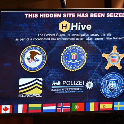A sign displaying a seized hidden site during a press conference to announce an international ransomware enforcement action, at the Justice Department in Washington, DC, on January 26, 2023. 