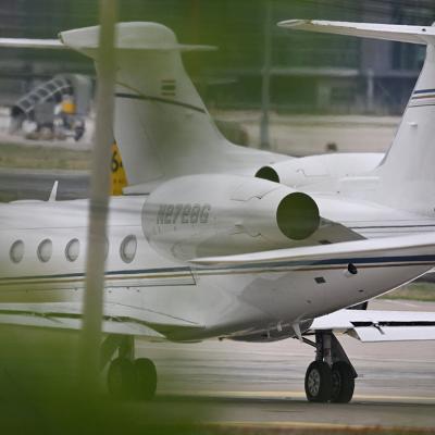 A view from behind of Tesla CEO, Elon Musk's private plane preparing to take off at Beijing Capital International Airport in China.