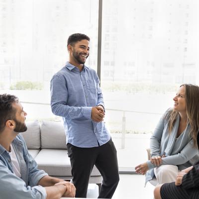 A company team laughing during their break.