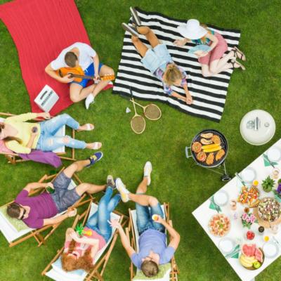 People sitting on a lawn.