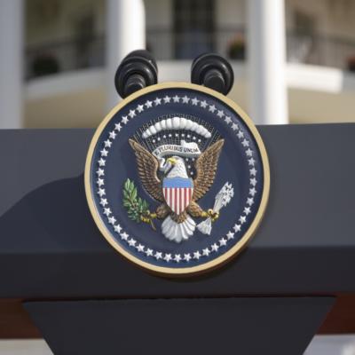 The U.S. seal on a podium.