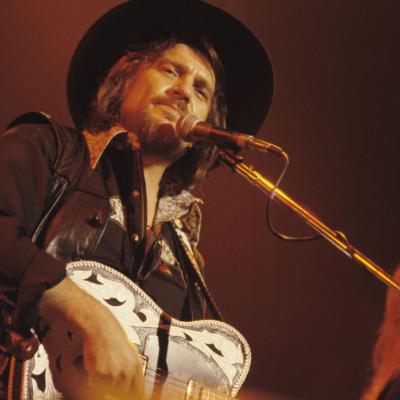 Country singer Waylon Jennings performs in 1979 in Atlanta, Georgia.
