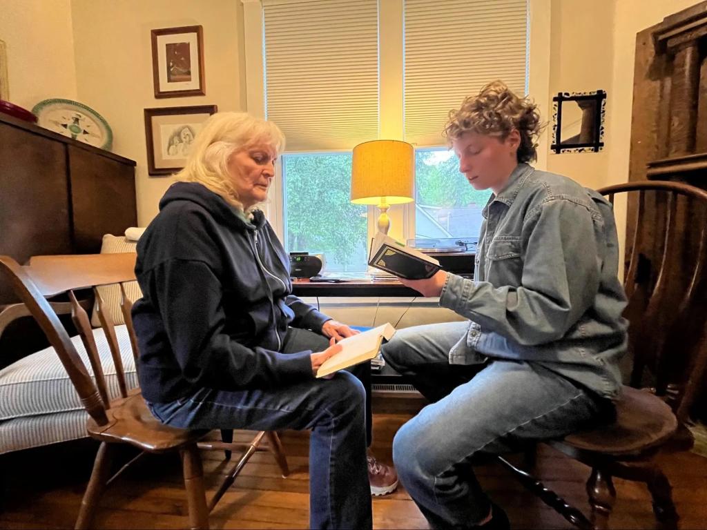 Ginny Hawker and her apprentice, Mary Linscheid, sing traditional Primitive Baptist hymns in the parlor of Hawker’s Elkins, West Virginia home. 