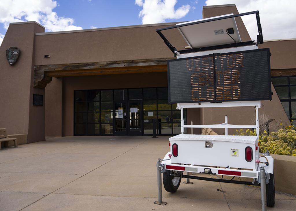 A 'Visitor Center Closed' sign at the entrance of Great Sand Dunes National Park Visitor Center during the government shutdown on October 3, 2025 in Mosca, Colorado.