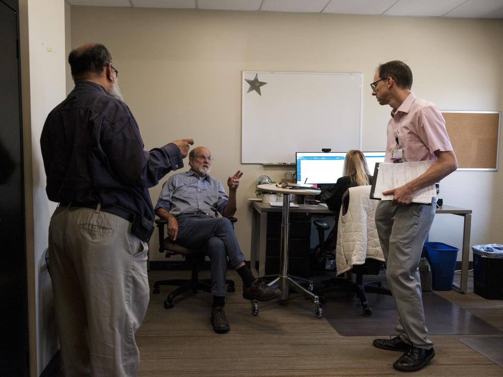 Dr. John Galgiani talks with Dr. Jonas Marschall about the development of a valley fever vaccine.