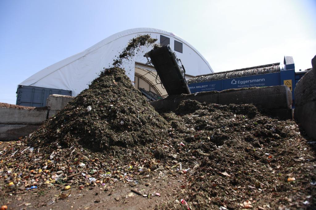 A machine sorts organic material (yard and food waste) at the Staten Island Compositing Facility in New York City. Despite a citywide requirement to compost food and yard waste, only 10% of the material is currently being diverted from landfills. 