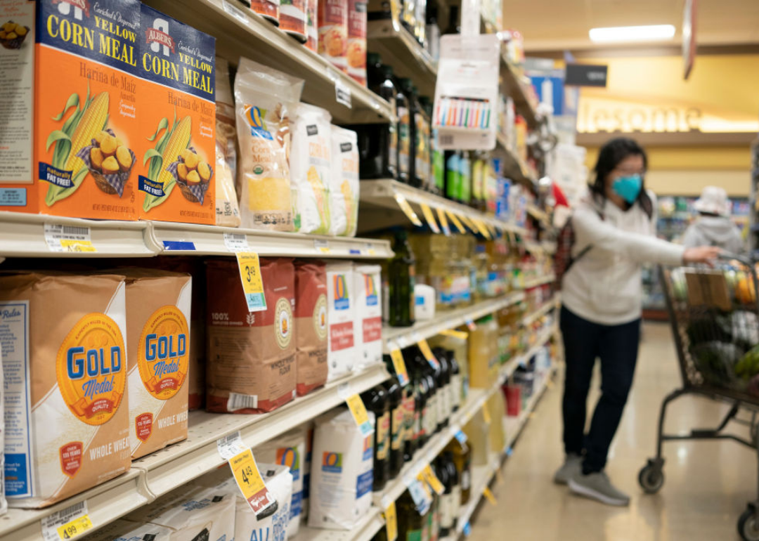 Woman shopping for flour in San Mateo, California